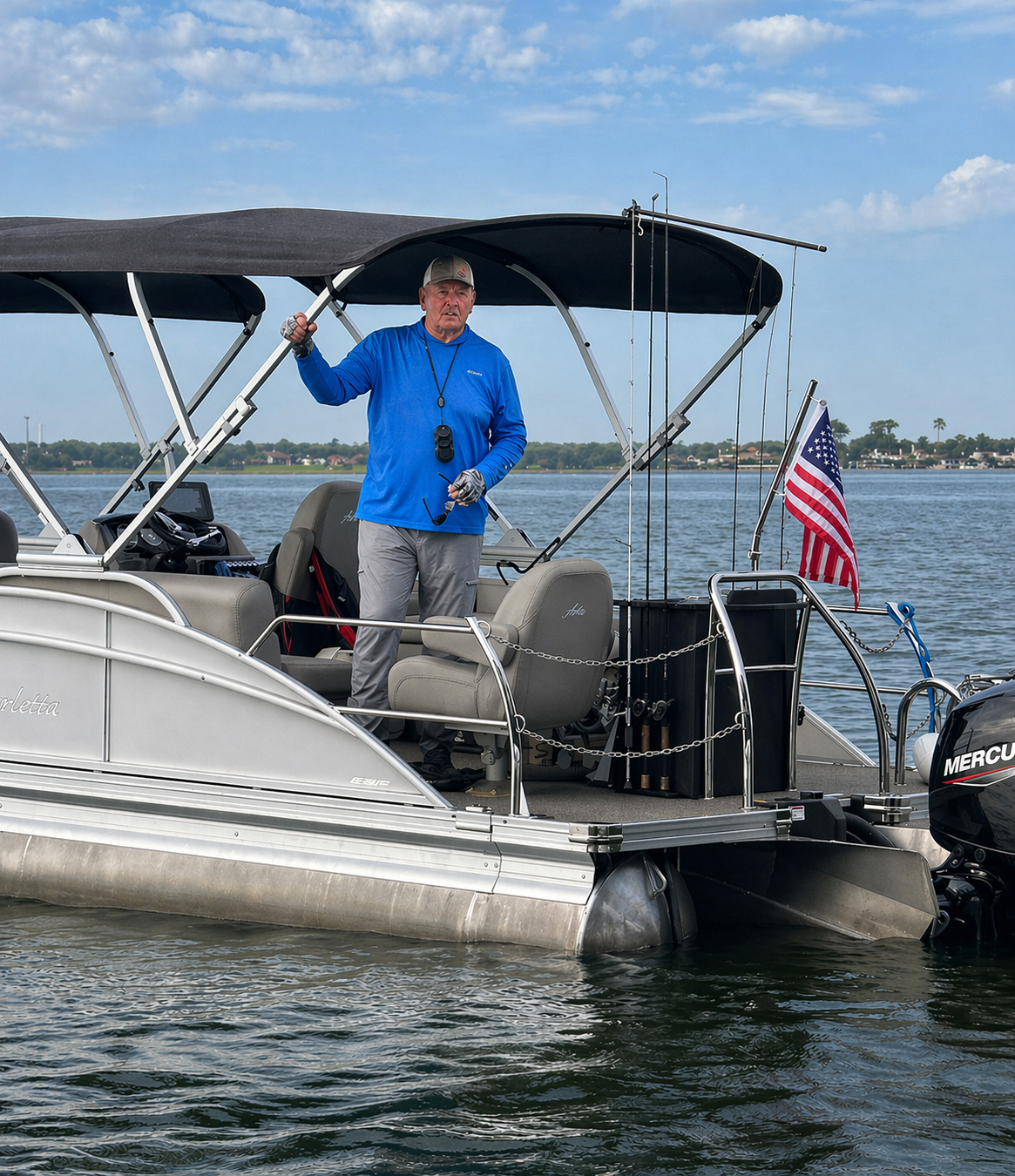 Ray Hunt standing on his Lake Conroe fishing boat